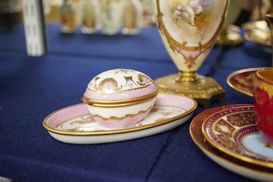 A collection of porcelain to include a Vienna cabinet cup and saucer, continental ormolu mounted urn, Limoges Bonbonniere and stand etc. tallest 20cm
